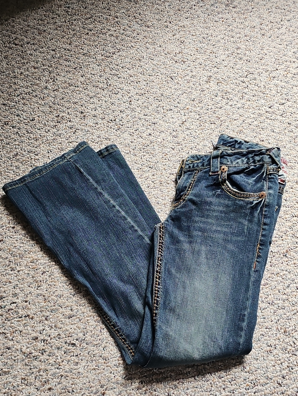 True Religion Women’s Bootcut Jeans in Dark Blue Wash.  28 Waist